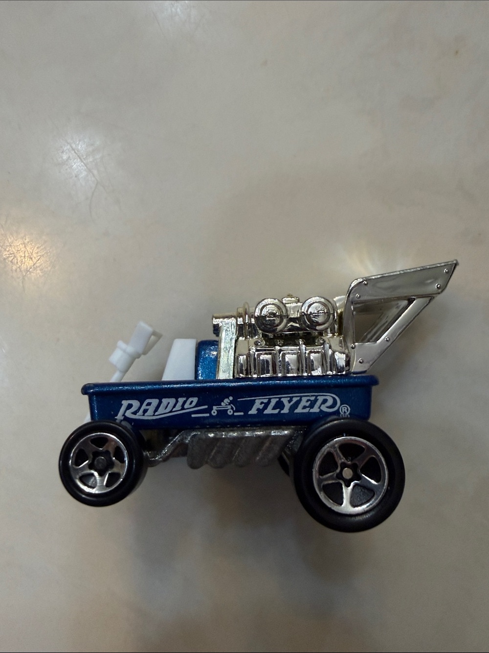 Radio Flyer Blue Kids Toy Car with Chrome Engine Detail